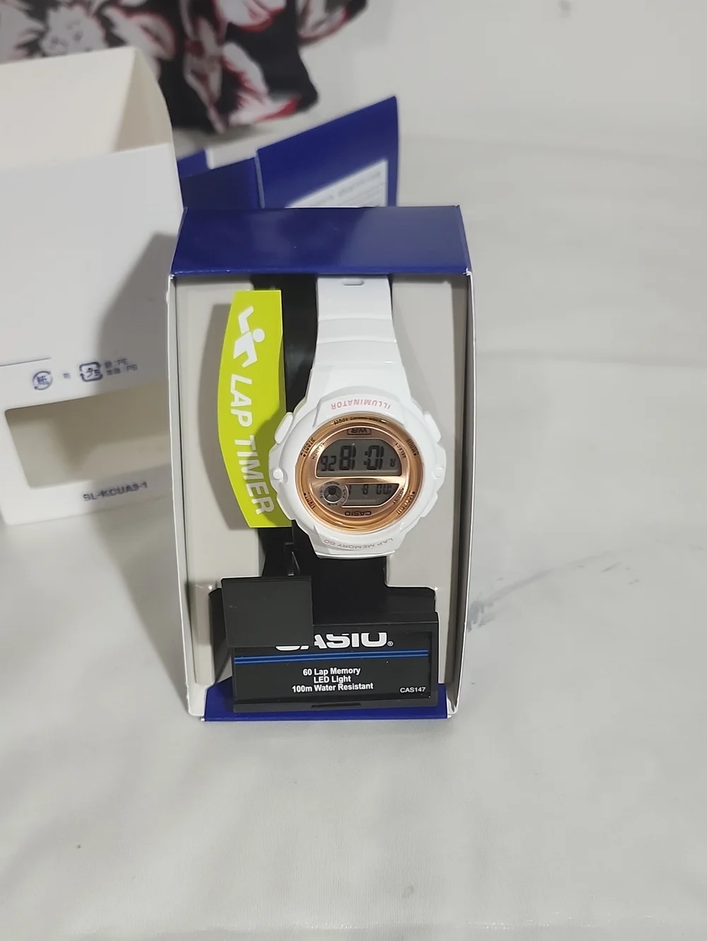 Casio White and Rose Gold Digital Sports Watch with Lap Timer